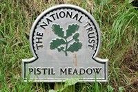 [National trust sign on walk]